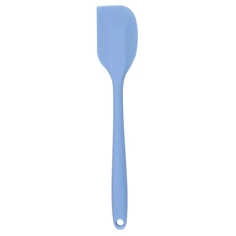 A vibrant red silicone baking spatula with an ergonomic handle and double-sided arc design, perfect for a variety of cooking and baking tasks.
