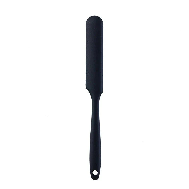 A vibrant red silicone baking spatula with an ergonomic handle and double-sided arc design, perfect for a variety of cooking and baking tasks.