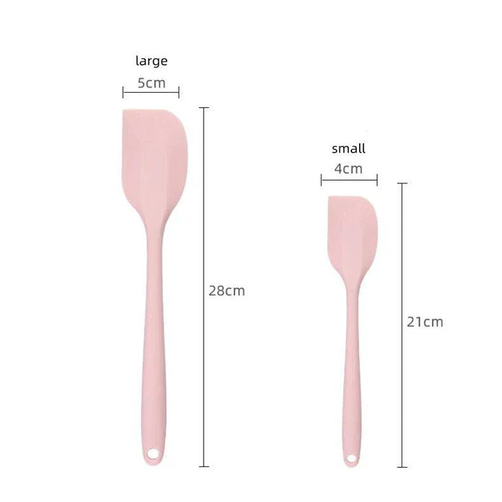 A vibrant red silicone baking spatula with an ergonomic handle and double-sided arc design, perfect for a variety of cooking and baking tasks.