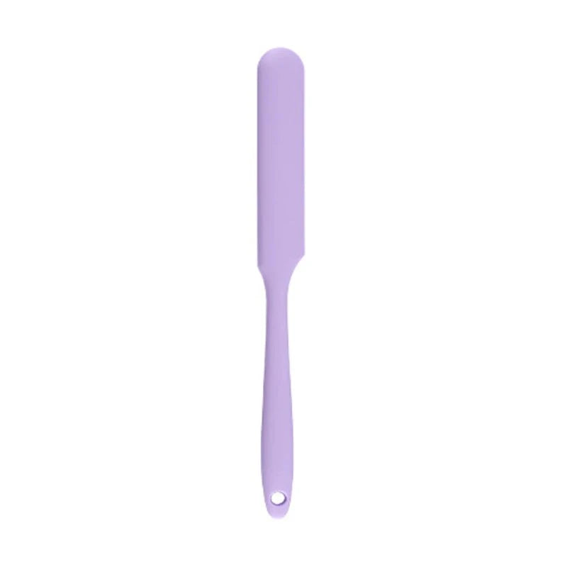 A vibrant red silicone baking spatula with an ergonomic handle and double-sided arc design, perfect for a variety of cooking and baking tasks.