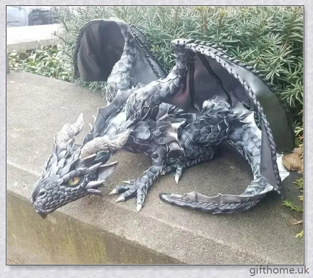 Large handmade resin and metal squatting dragon sculpture, with a mysterious and enchanting design that brings delight to indoor and outdoor spaces.