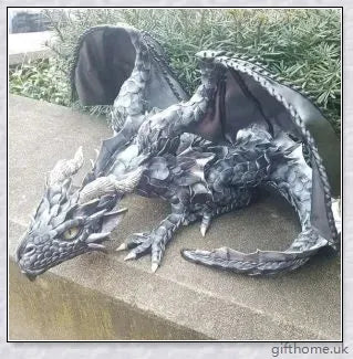 Large handmade resin and metal squatting dragon sculpture, with a mysterious and enchanting design that brings delight to indoor and outdoor spaces.