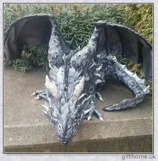 Large handmade resin and metal squatting dragon sculpture, with a mysterious and enchanting design that brings delight to indoor and outdoor spaces.
