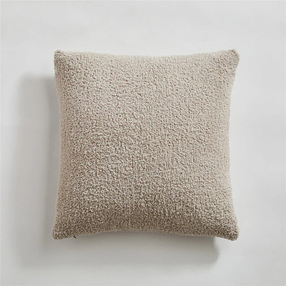 Cosy plush sofa cushion cover made of soft and fluffy microfibre material in a solid yellow colour