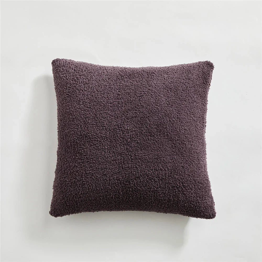 Cosy plush sofa cushion cover made of soft and fluffy microfibre material in a solid yellow colour