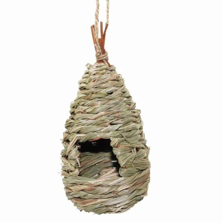 A natural straw bird's nest with a cosy, inviting design to provide a comfortable home for birds.