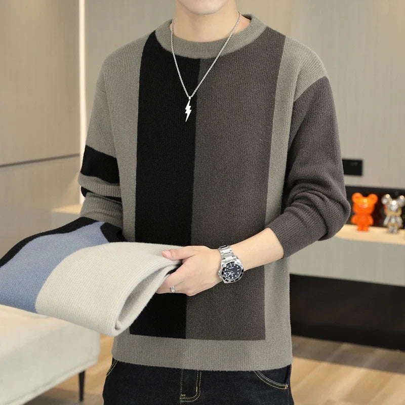 A cosy, warm brown and creamy white colour block jumper for men, featuring a crew neckline and long sleeves