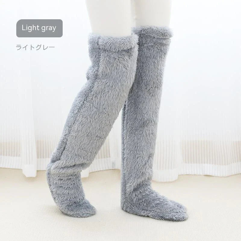 Cozy over-the-knee fuzzy socks in various colors, including brown, blue, dark gray, and pink purple