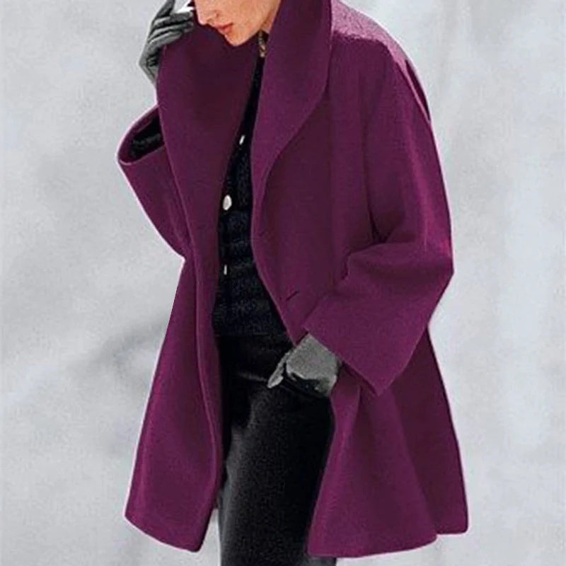 A stylish woollen coat in a variety of vibrant colours, perfect for the autumn and winter seasons.