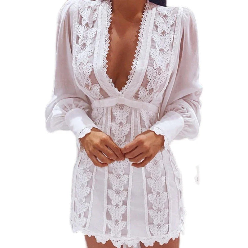 Elegant white lace dress with butterfly sleeves and a high-waist design, perfect for special occasions.