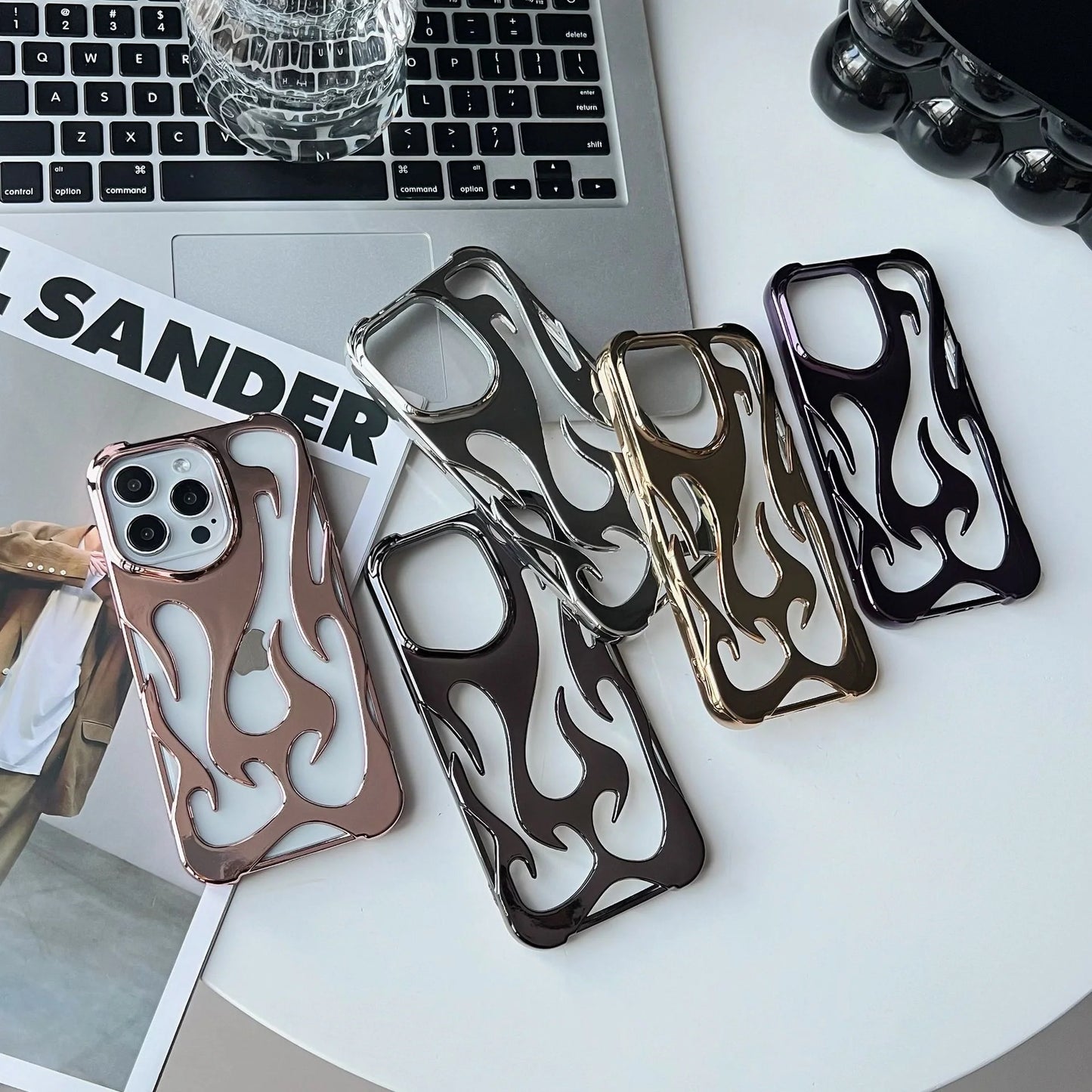 Premium electroplated iPhone case with hollow flame pattern for heat dissipation