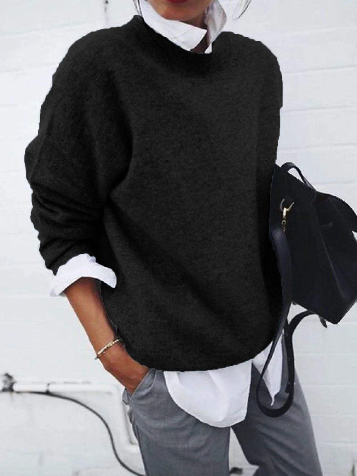 A long sleeve knitted jumper in various solid colours, including light gray, black, khaki, blue, and pink