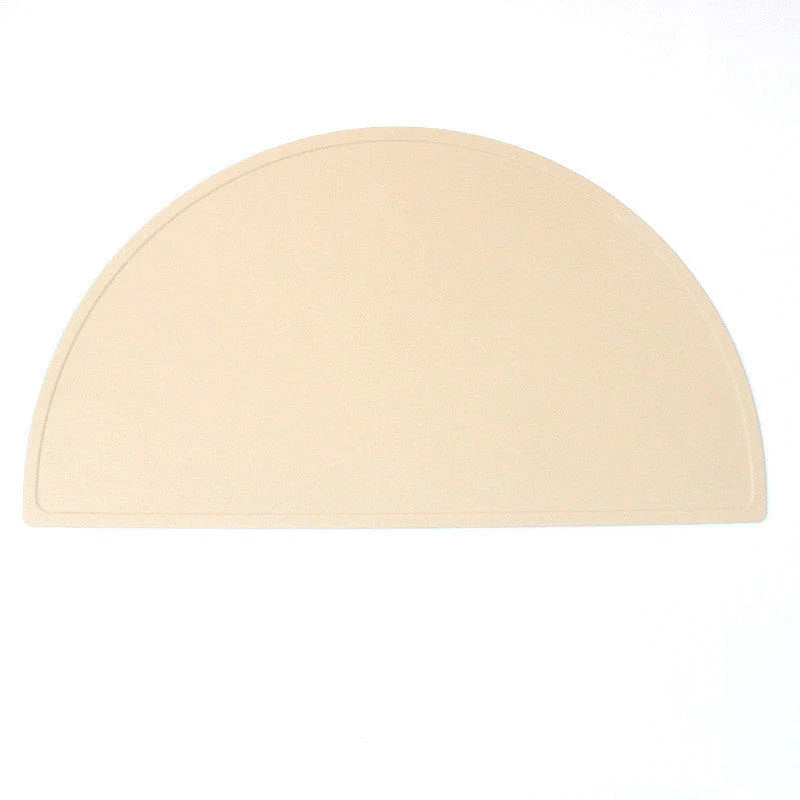 Durable silicone placemat in various colors, featuring waterproof and stain-resistant properties for easy cleaning