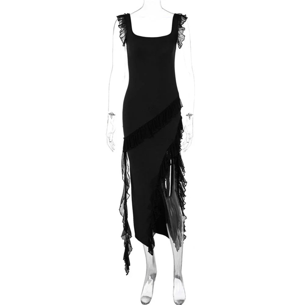 Elegant satin slip dress with ruffle detailing and thigh-high slit, available in various colours and sizes.