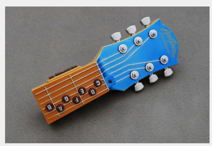 Innovative infrared guitar with chord selection buttons, adjustment controls, and tilt sensor for effortless string-free musical expression