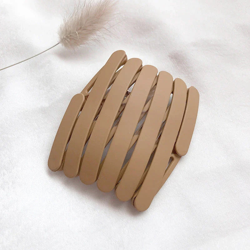 Retractable Pocket Hair Band - A stylish, secure, and convenient hair accessory that can be easily stored in your pocket or bag.