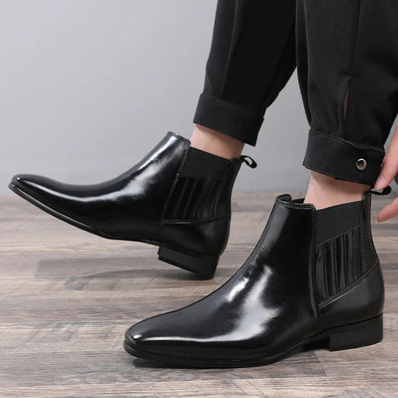 Stylish pointed toe Chelsea boots for men in black and brown colors, featuring a square heel and British-inspired design.