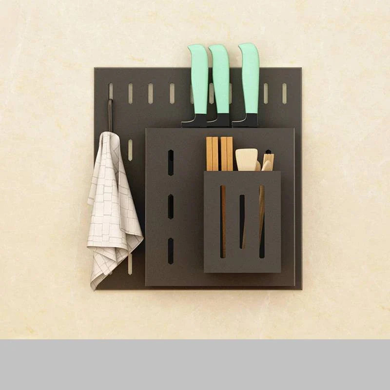 A high-quality stainless steel wall-mounted kitchen storage rack with a perforated design for customisable storage