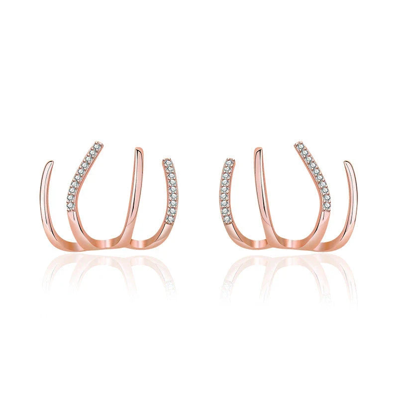 Radiant sterling silver earrings with four-prong zircon stone settings, elegant and fashionable jewelry for women