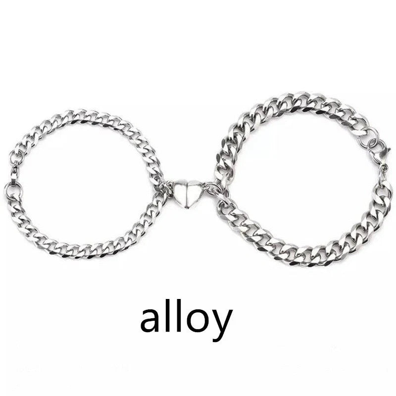 Elegant titanium steel couple bracelets with heart design, perfect for love gifts.