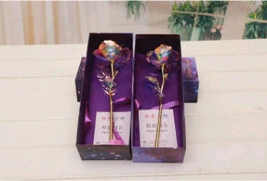 A luxurious 24K gold-plated rose flower bouquet set with a gift box and tote bag
