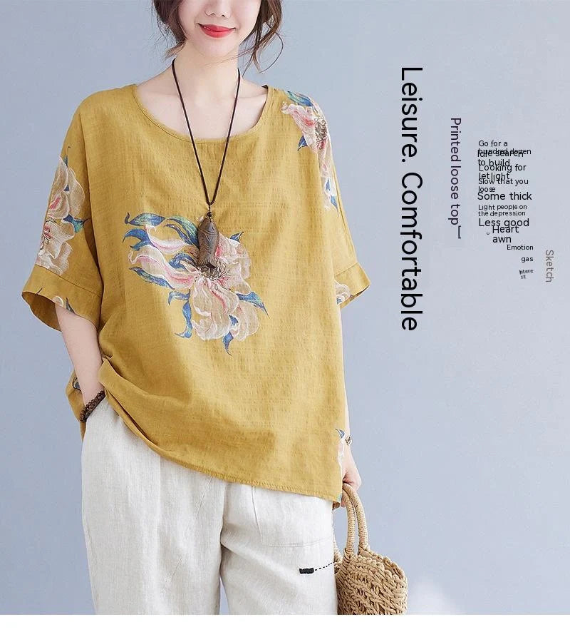 Stylish cotton-blend summer top in yellow and orange colours, featuring a conventional sleeve design and premium natural fabrics