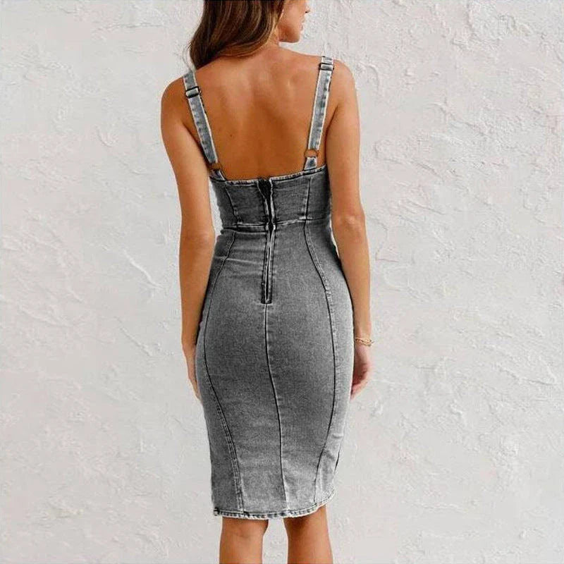 Chic denim dress with modern U-neck design, adjustable straps, and slit detail for a flattering, versatile look