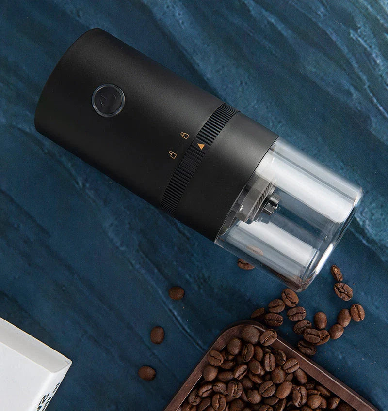 Portable electric coffee grinder with adjustable grind settings, USB-C charging, and dishwasher-safe components for fresh ground coffee on the go.
