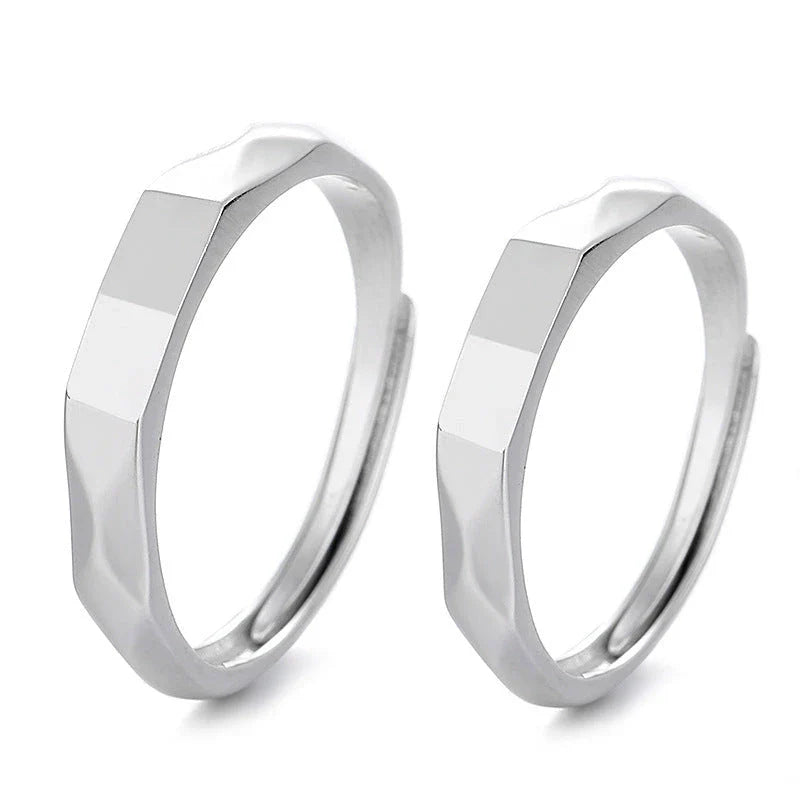Stylish sterling silver rings with a hidden love pattern design, perfect for romantic gifts or personal accessorizing.