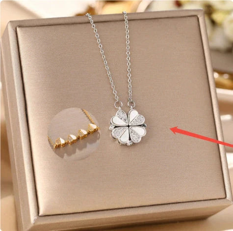 Luxe four-leaf clover pendant necklace crafted with stainless steel and crystal heart charm for women