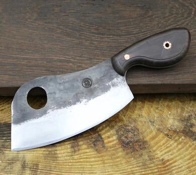 Handcrafted Chinese cleaver knife with high-carbon steel blade on wooden cutting board