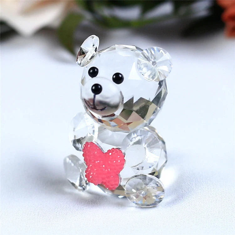 Hand-carved white crystal bear figurine with geometric design