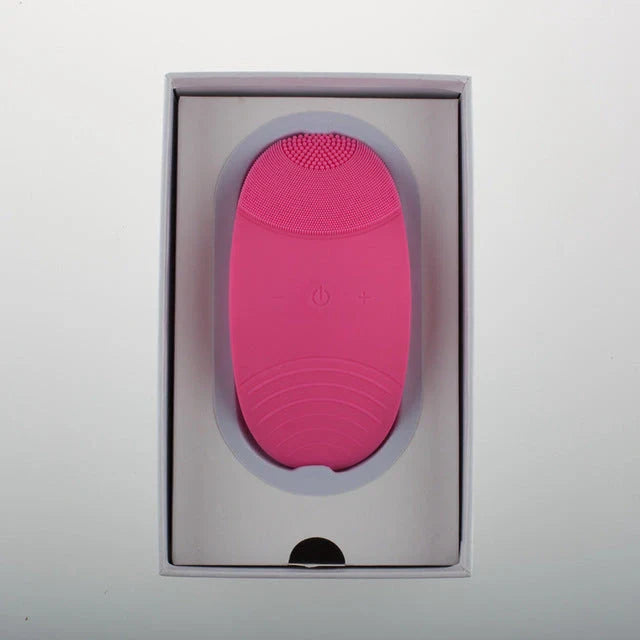 A rose red, ultrasound-powered facial cleansing device with adjustable gear positions for customised power and convenience.