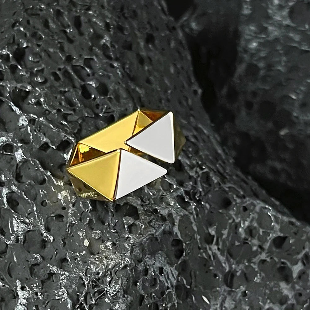 Close-up of a 18K gold-plated ring featuring a genuine meteorite insert with mesmerising natural patterns