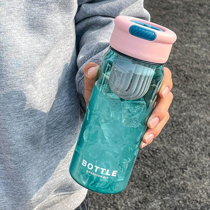 Minimalist modern sports water bottle with tea infuser compartment, in pink colour