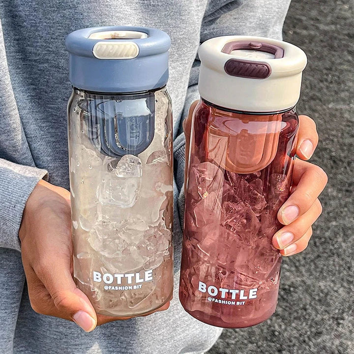 Minimalist modern sports water bottle with tea infuser compartment, in pink colour