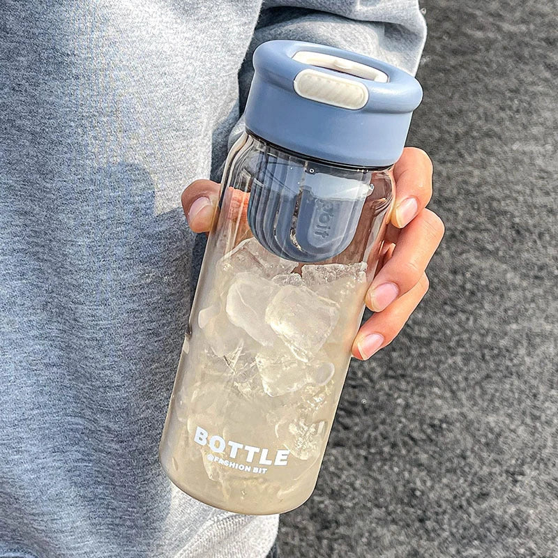 Minimalist modern sports water bottle with tea infuser compartment, in pink colour