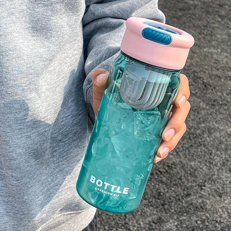 Minimalist modern sports water bottle with tea infuser compartment, in pink colour