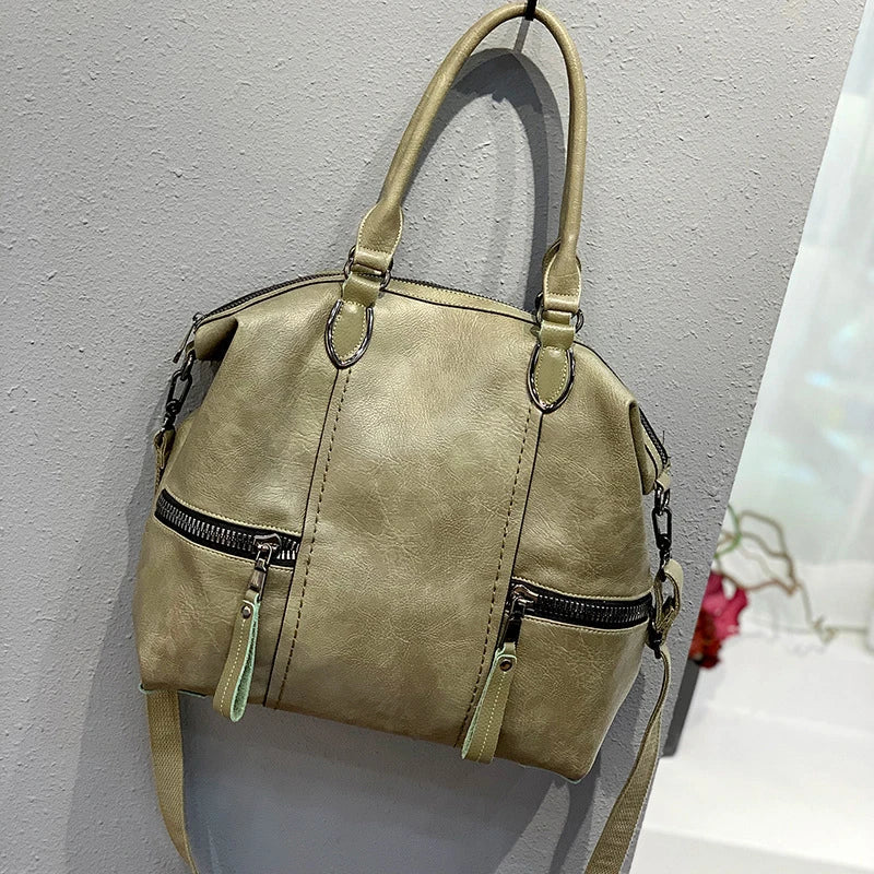 A stylish and spacious leather shoulder messenger bag in a variety of colours, featuring high-quality British craftsmanship