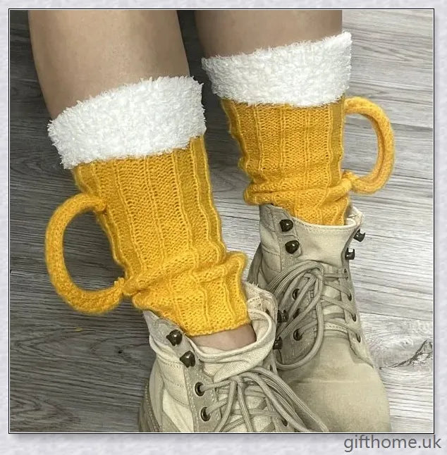 Vibrant yellow 3D beer stein patterned mid-calf socks made from soft, warm polyester