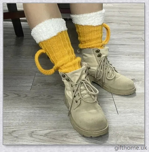 Vibrant yellow 3D beer stein patterned mid-calf socks made from soft, warm polyester