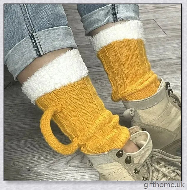 Vibrant yellow 3D beer stein patterned mid-calf socks made from soft, warm polyester