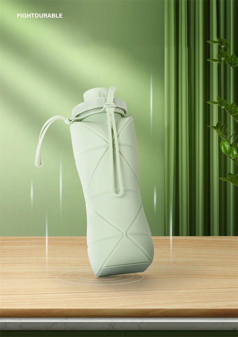 Folding silicone water bottle in various colours, perfect for outdoor activities like hiking, camping, and cycling