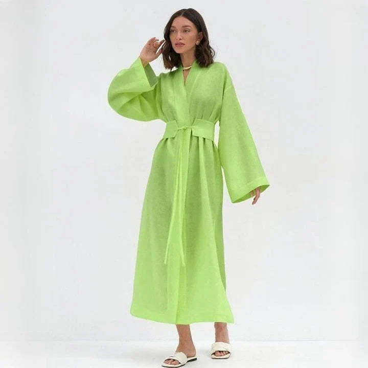 Elegant cotton linen long dress in green with a belt, showcasing a flattering A-line silhouette and full-length sleeves.