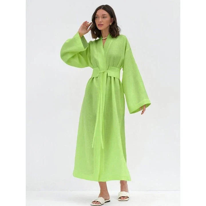 Elegant cotton linen long dress in green with a belt, showcasing a flattering A-line silhouette and full-length sleeves.
