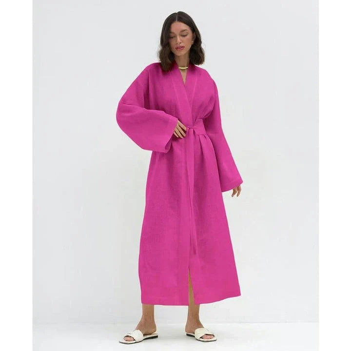 Elegant cotton linen long dress in green with a belt, showcasing a flattering A-line silhouette and full-length sleeves.
