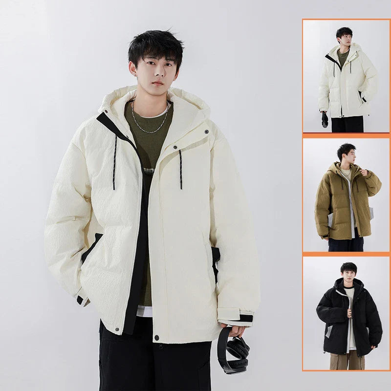 A cosy, black 90% white duck down jacket with a streamlined, modern design, perfect for navigating the ever-changing British weather.