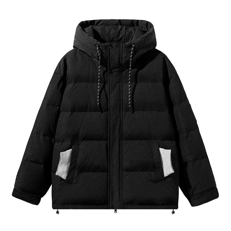 A cosy, black 90% white duck down jacket with a streamlined, modern design, perfect for navigating the ever-changing British weather.