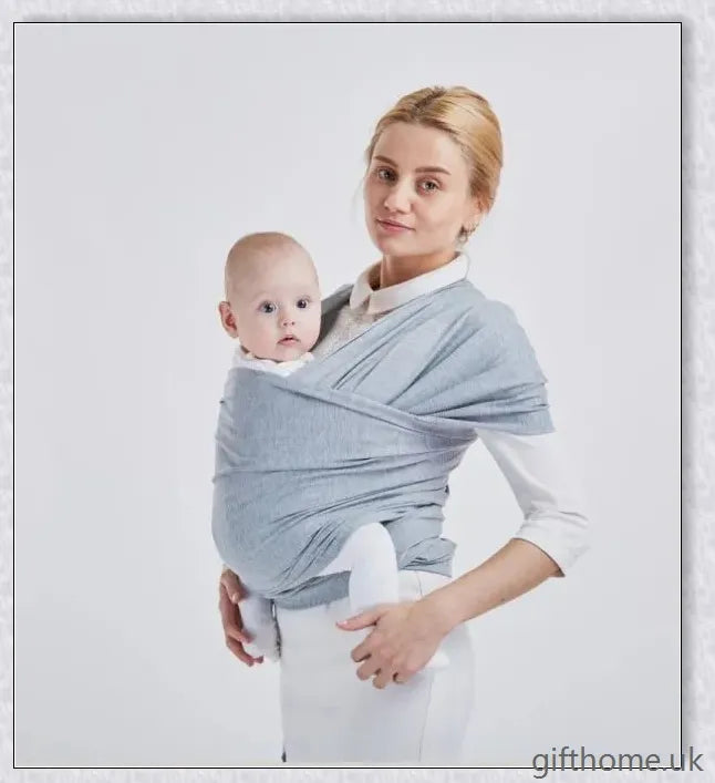 A cosy and comfortable baby carrier sling in a stylish design, perfect for hands-free parenting during family adventures