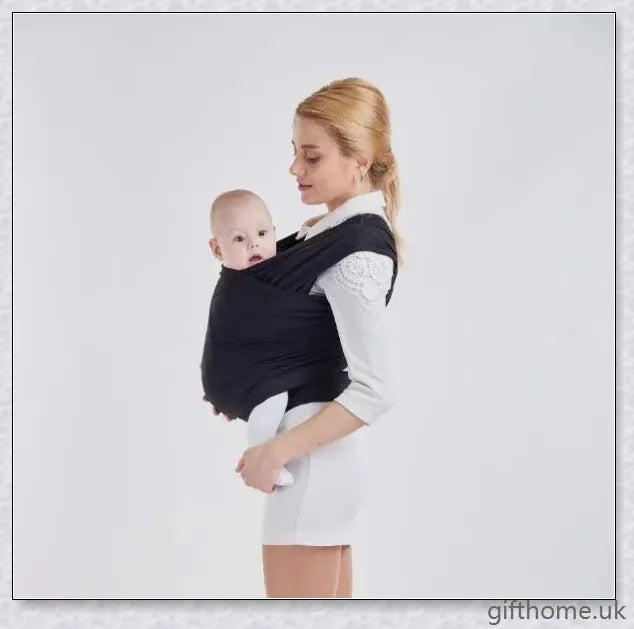 A cosy and comfortable baby carrier sling in a stylish design, perfect for hands-free parenting during family adventures